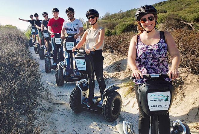 7 tourists on x2 PT in a beach area